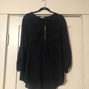 Black 3/4 sleeve blouse with gold zipper.
